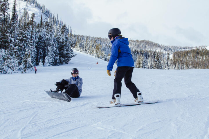 Two skiers enjoying the slopes at Lost Trail Ski Area.